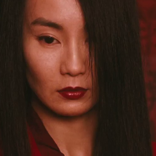 VLC screenshot of Maggie Cheung, cropped from original